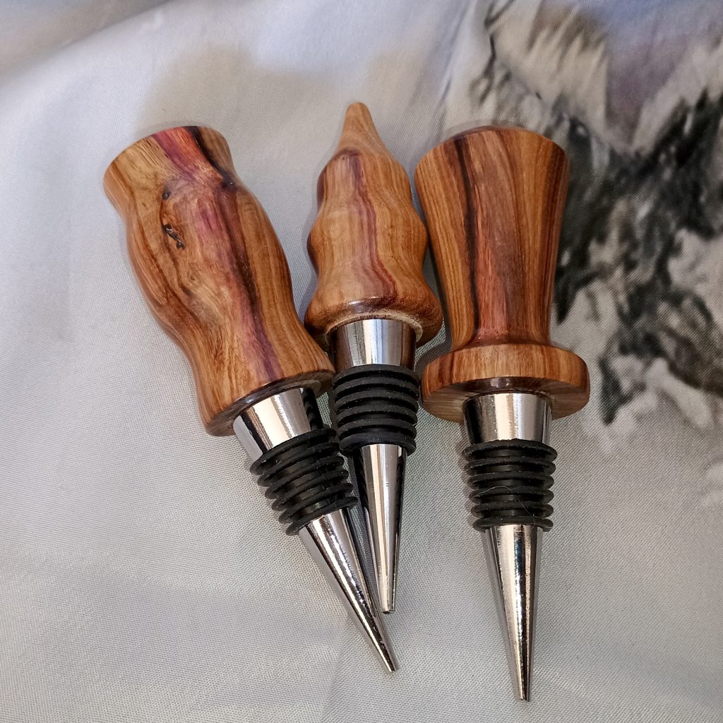 Bottle Stoppers Canary Wood Burl by Sarkanys Rising