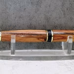 Handcrafted cigar-style gold and black pen with exotic tulipwood barrel, artisan hand-turned luxury writing instrument and elegant desk gift by Sarkanys Rising