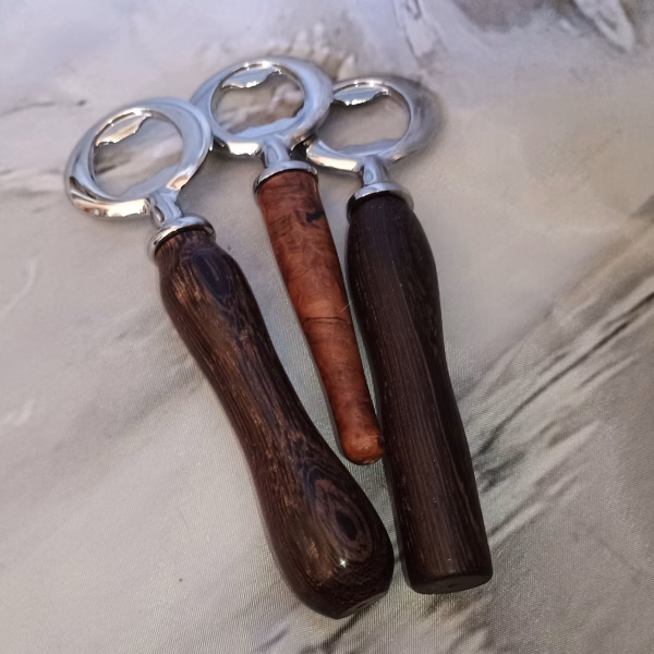 Bottle openers made from dark hardwoods – rich tones and artisan polish