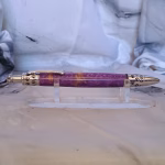 Chrome pen featuring dog-bone clip and bold patterns in BoB hardwood