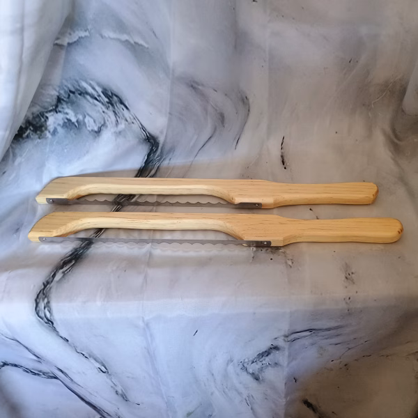 Clear pine bow knife – lightweight and smooth with pale golden grain
