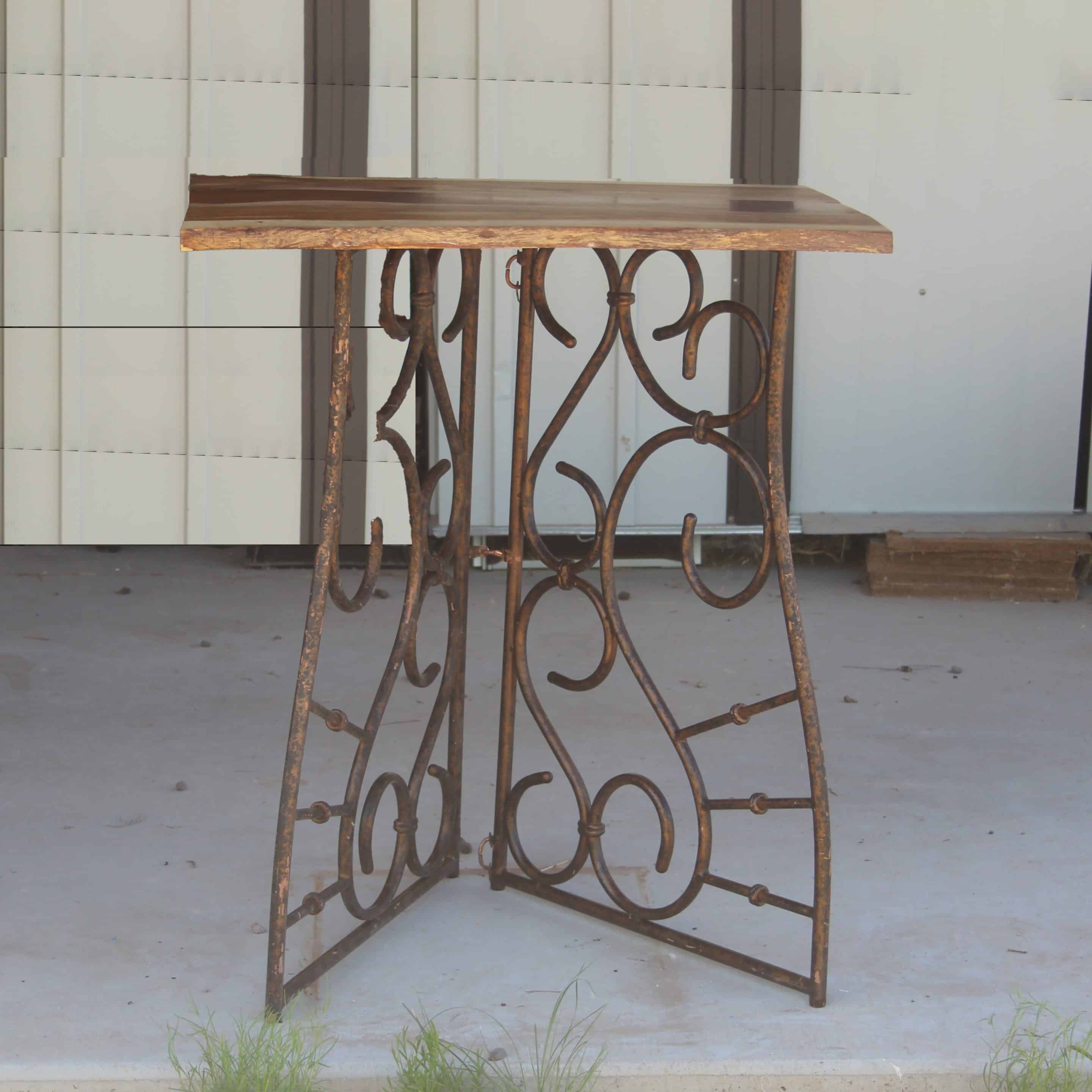 Full length image of a live edge wood table that shows the beautiful reclaimed base of the Arizona Table