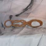 Hand-carved basswood pasta stirrer with intricate Celtic knotwork handle, artisan kitchen tool, 9 inches